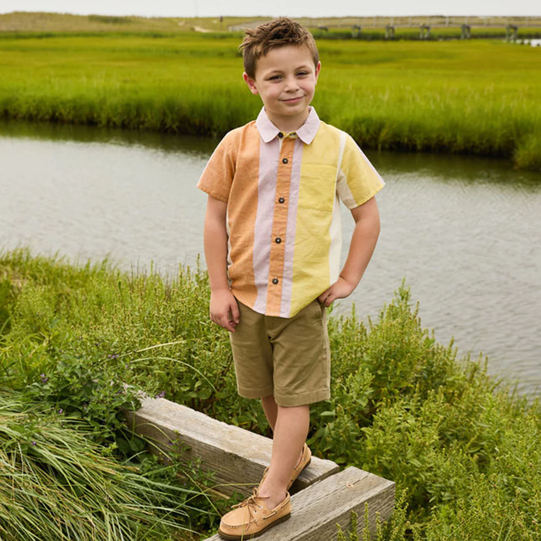 a boy at the farm wearing Jack Shirt - Desert Stripe