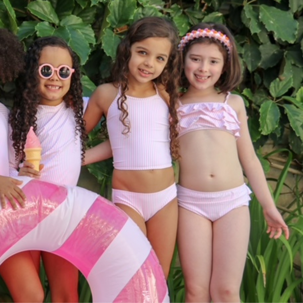 3 little girls in the garden wearing Pink Dream Tankini