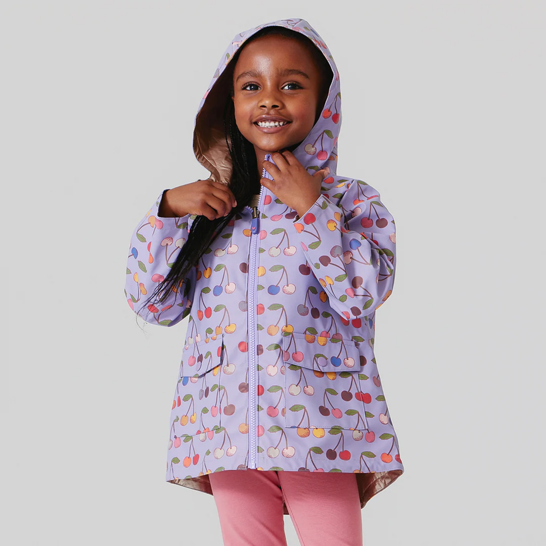 a girl wearing Rafa Rain Coat - Lavender Cherry