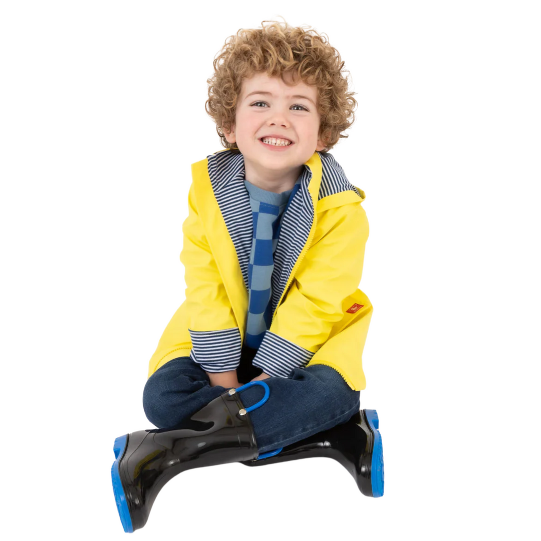 a boy wearing Raincoat in Cyber Yellow