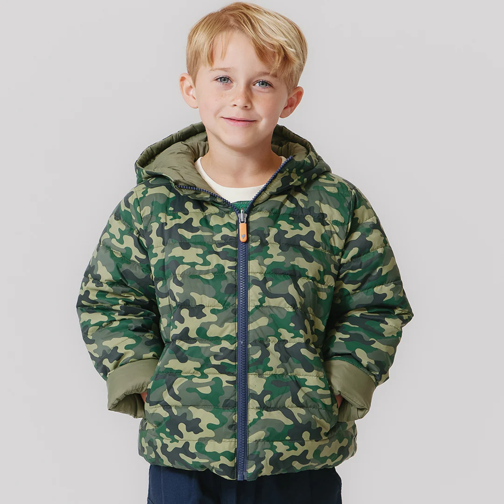 a boy wearing Reversible Riley Jacket - Green Camo