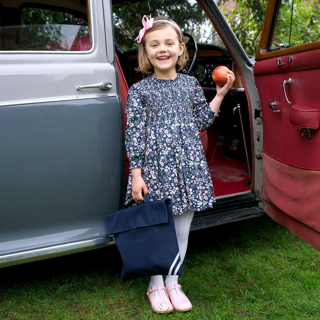 a girl wearing Rose Ruched Frill Dress in Navy