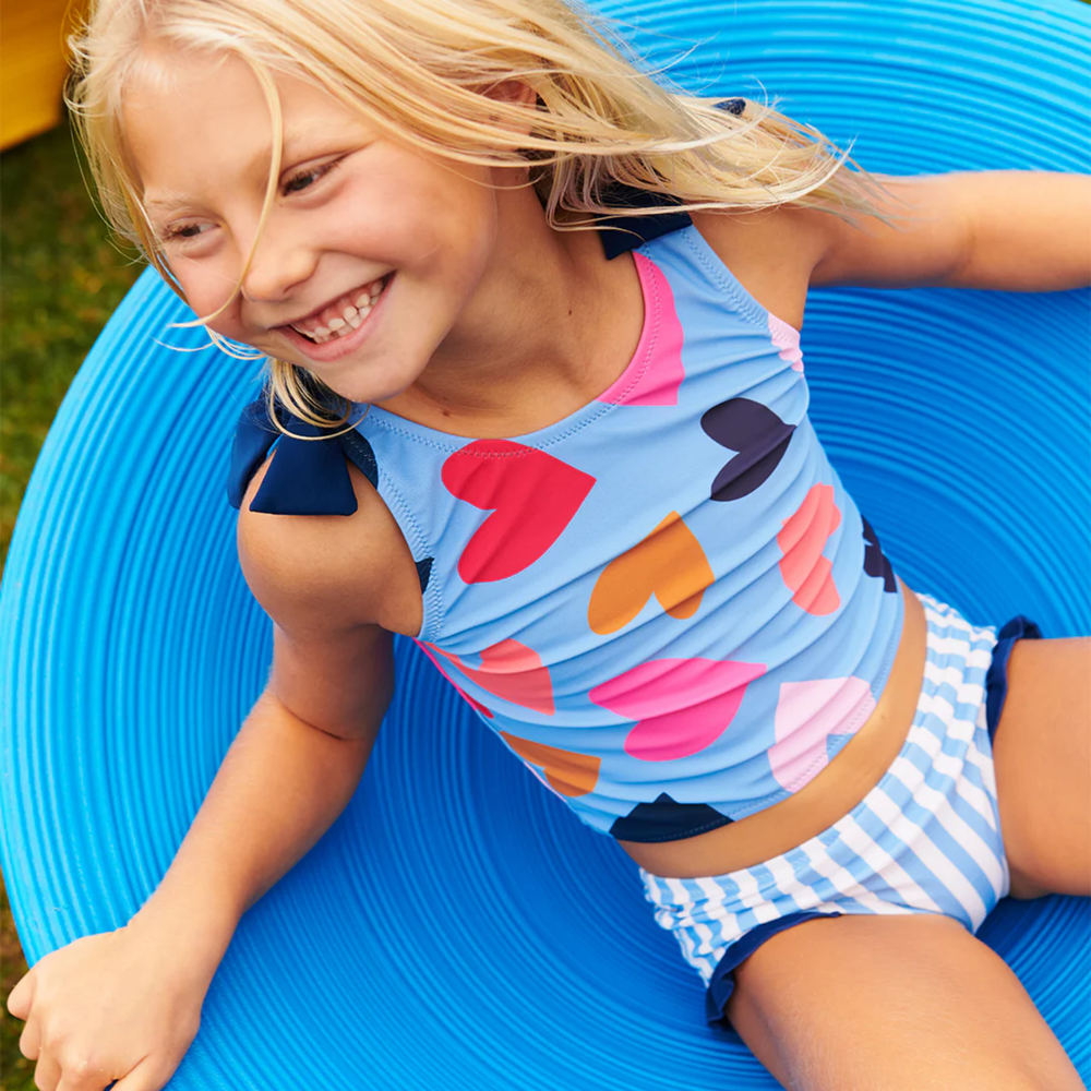 a girl wearing Shelly Tankini - Multi Tossed Hearts