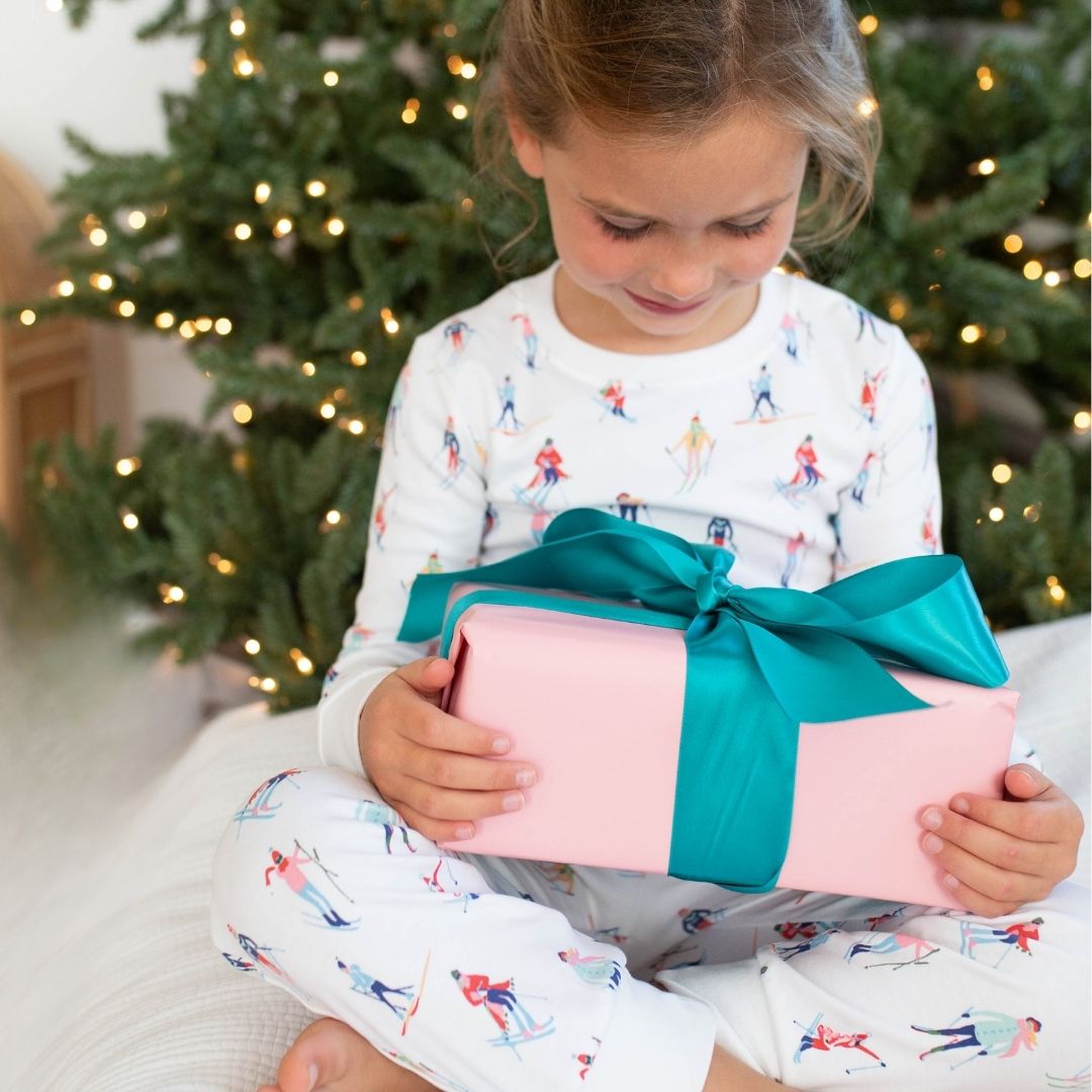 child holding present