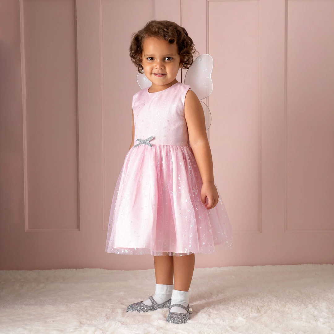 a little girl wearing Sparkle Tulle Dress in Pink