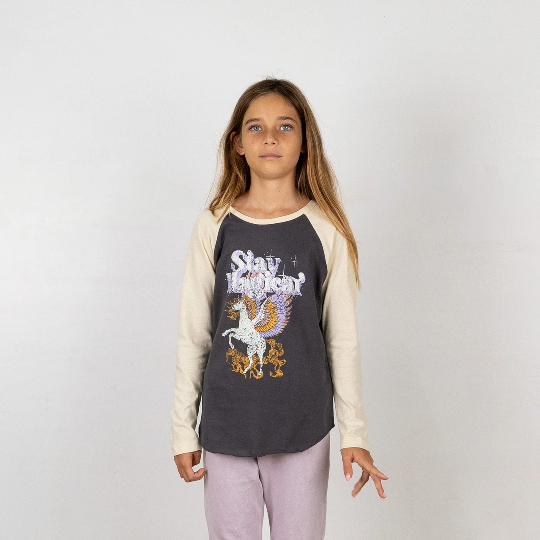 a girl wearing Stay Magical Raglan in Vintage Black And Cream