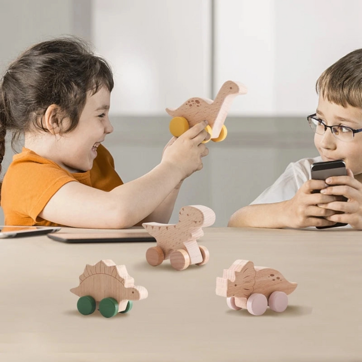 a kids playing Stegosaurus Toy with Green Wheels