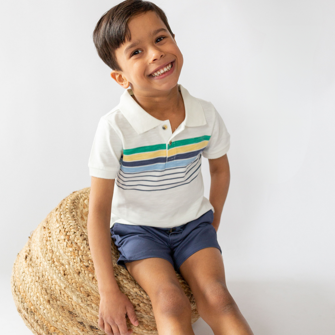 a boy wearing Andrew Polo in Cool Multi Stripe