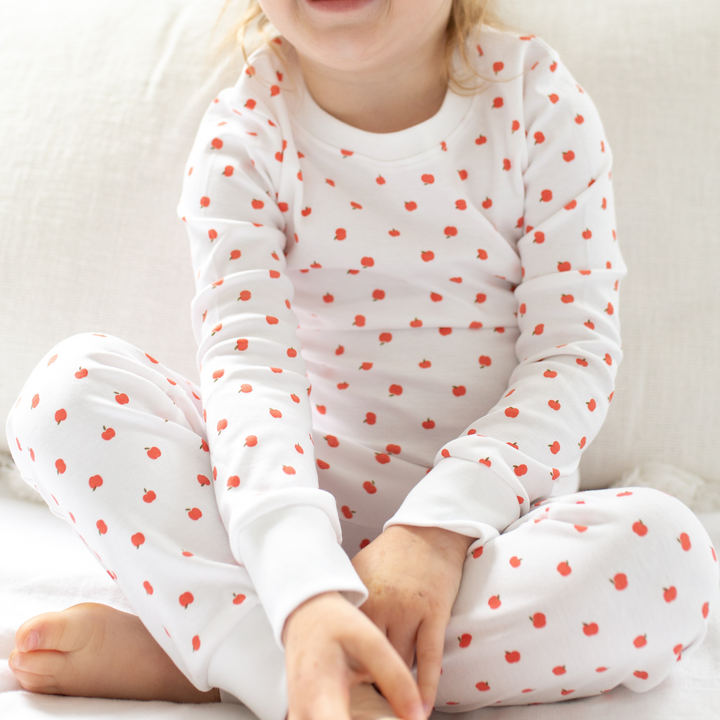 a little girl wearing Sweet Apple Pajama Set