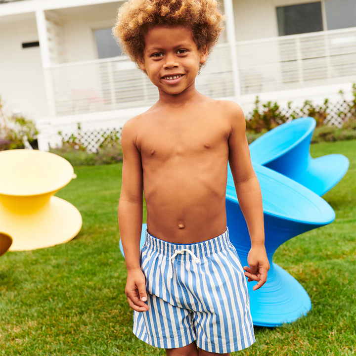 a boy wearing Swim Trunk - Blue Stripe