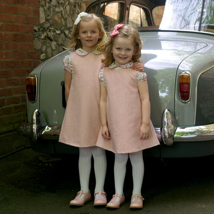 the girls wearing Tweed Pinafore Set in Pink