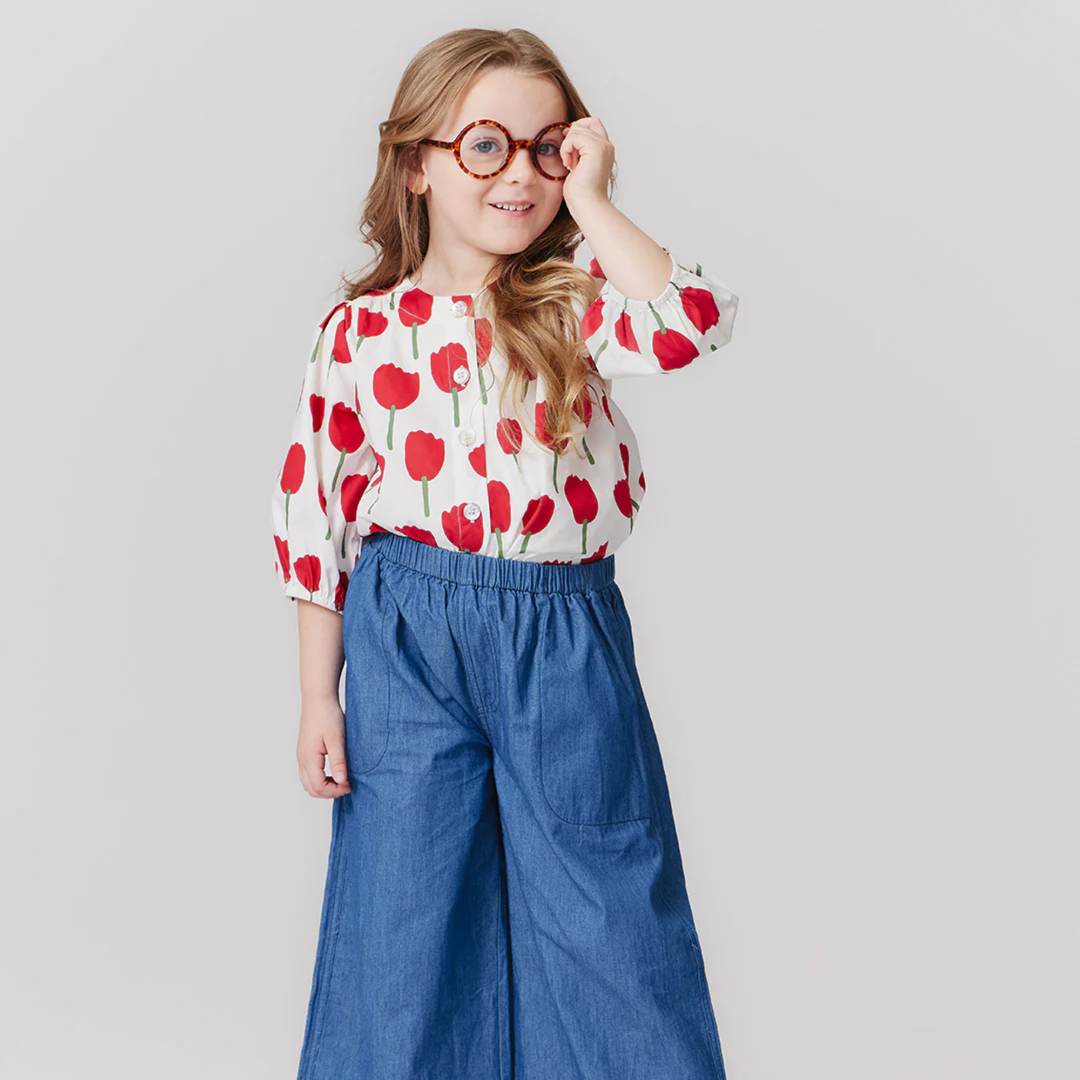 a little girl wearing Wylie Pant - Chambray