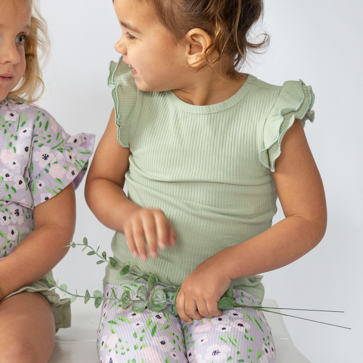 a little girl wearing Elsa Flutter Tank in Desert Sage