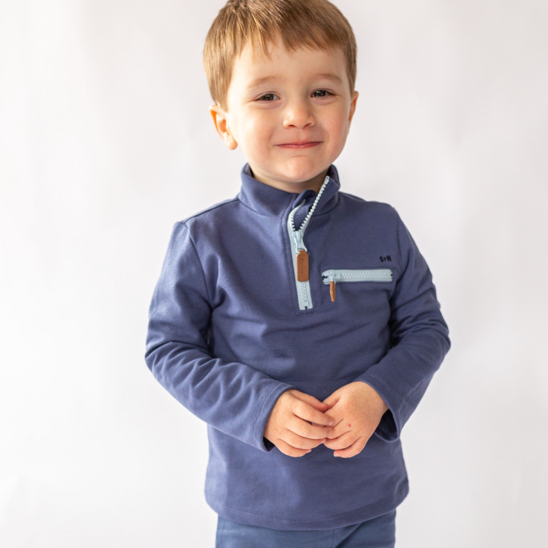 a little boy wearing Max Half Zip Sweatshirt in Washed Indigo