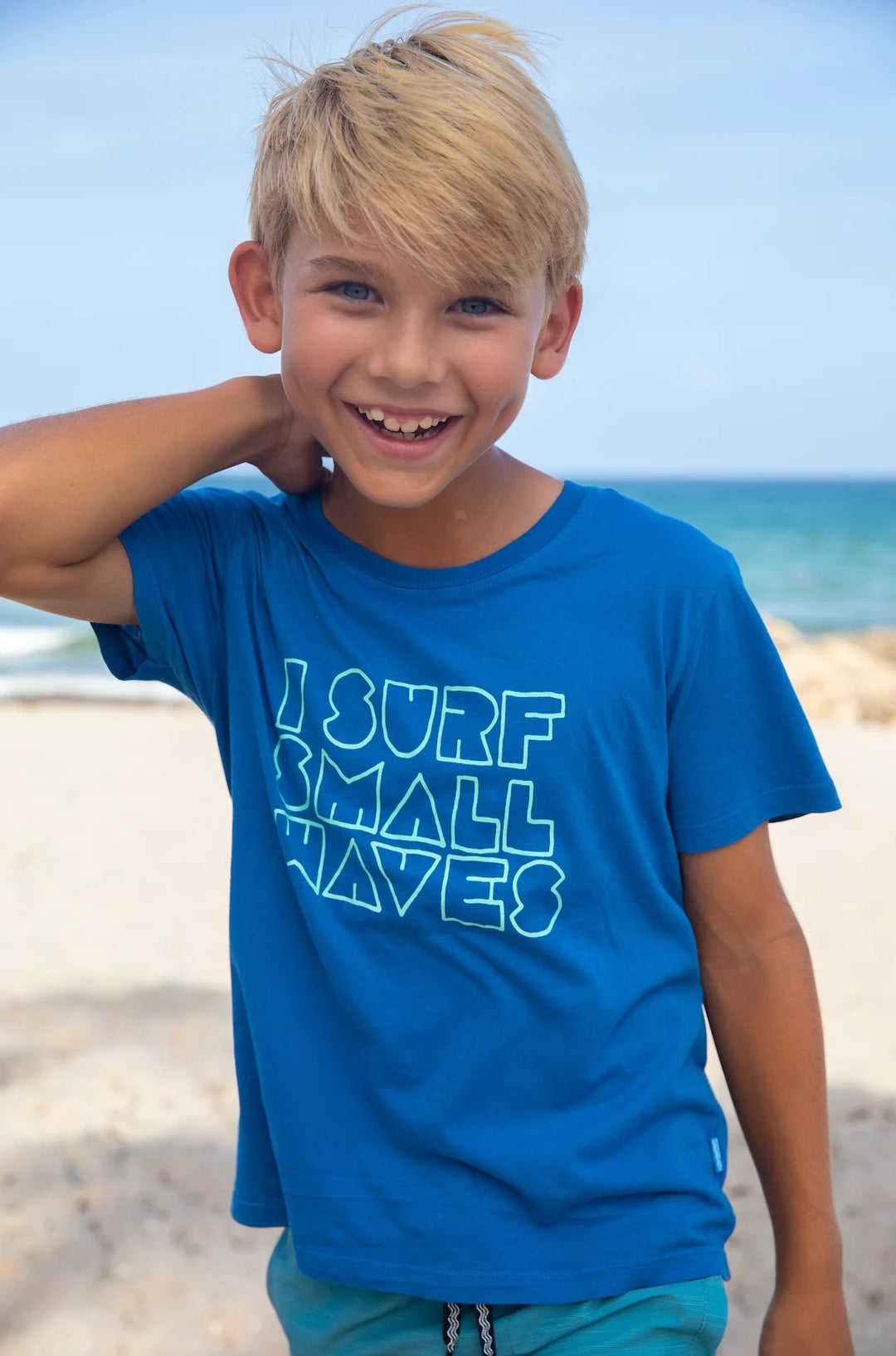 boy wearing blue tshirt