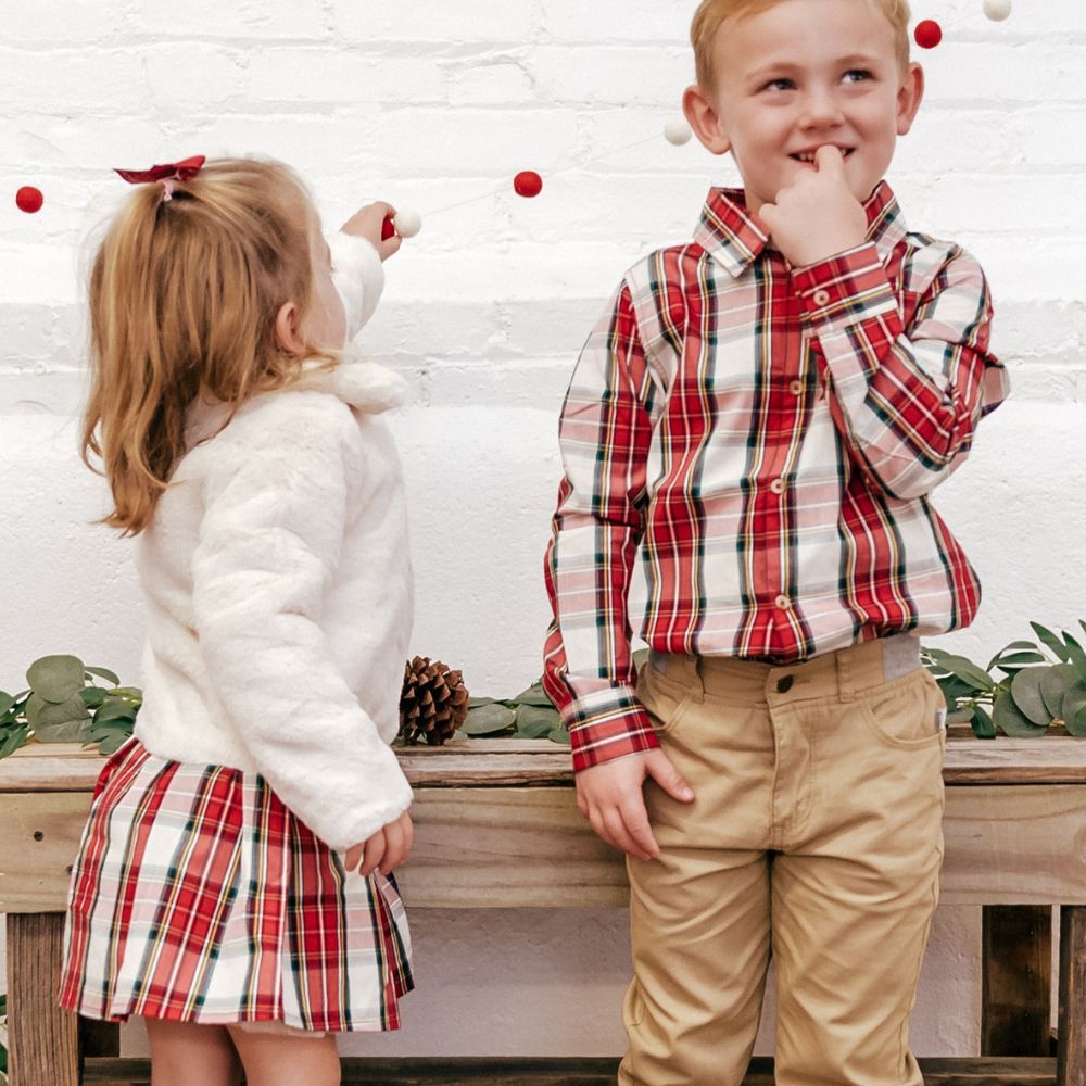 boy wearing plaid buttondown and girl