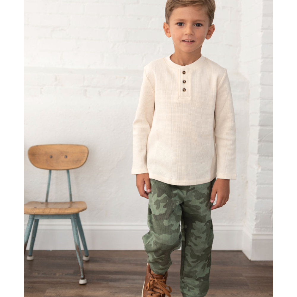 boy wearing ivory thermal camo pants