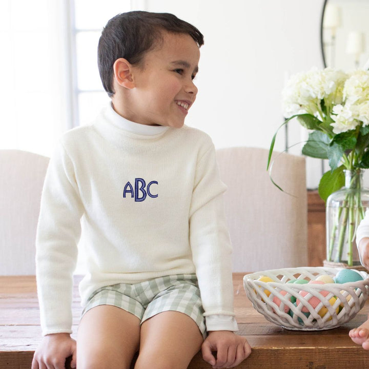 Rollneck sweater with monogram on child