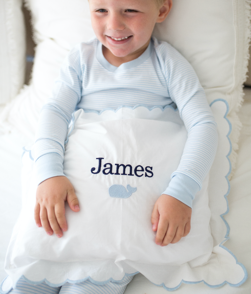 boy with monogrammed pillow