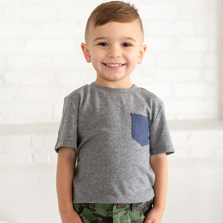 boy wearing grey tshirt