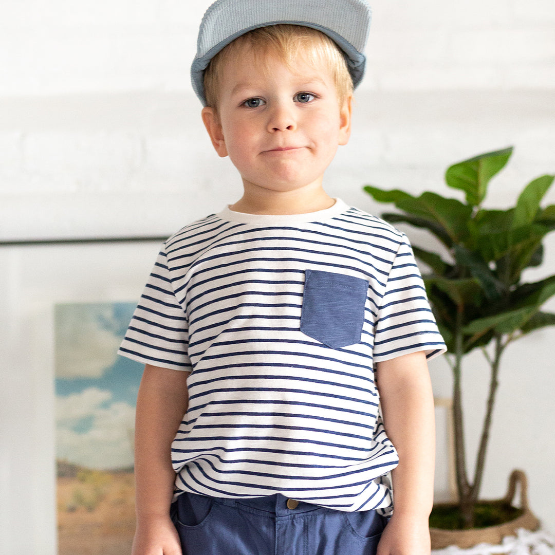 boy wearing navy striped tshirt