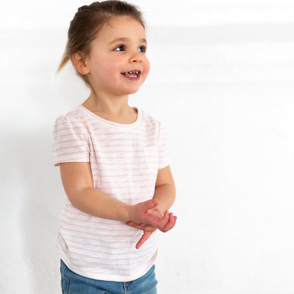 girl wearing pink stripe shirt