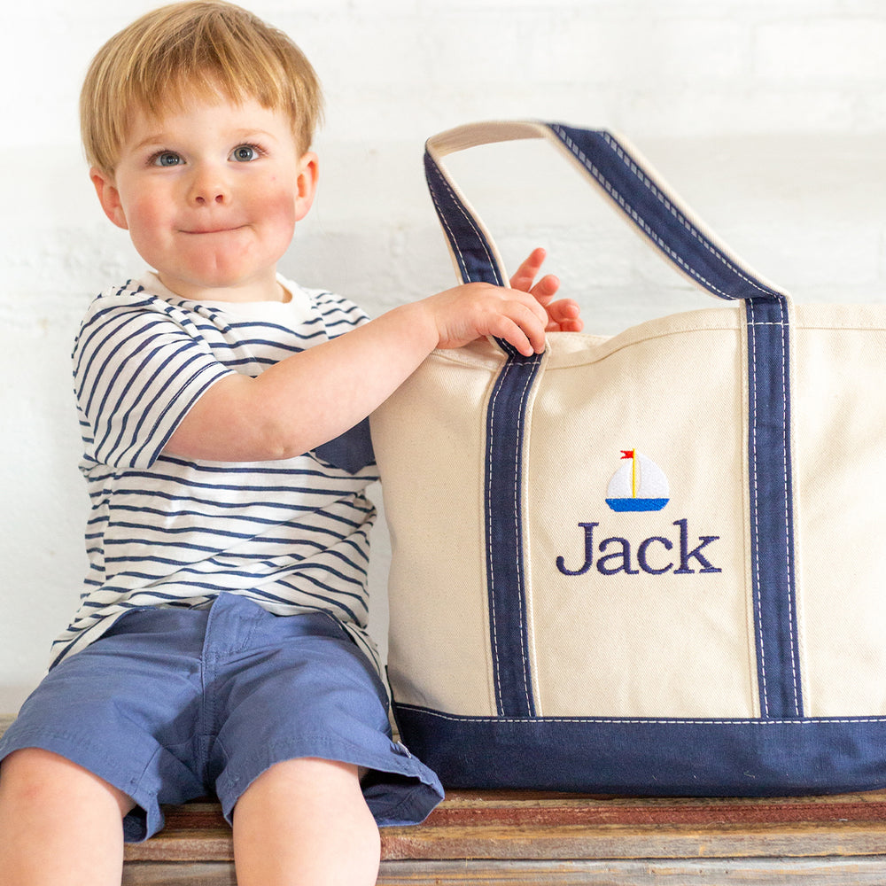 boy with large tote bag 