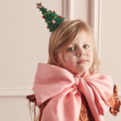 girl wearing tree headband